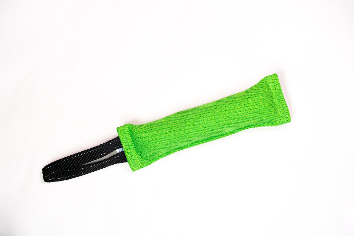 Green fabric tug toy with black handle
