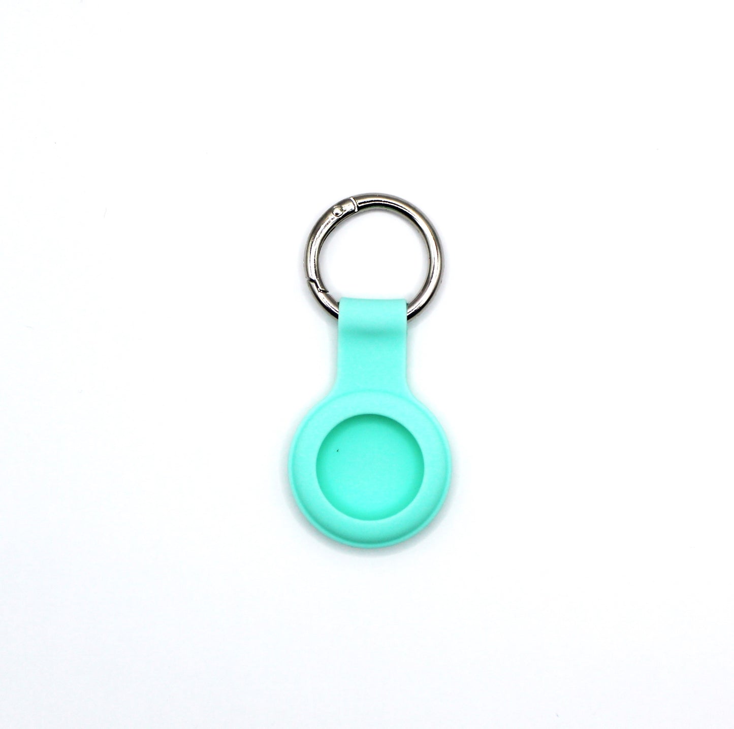 Turquoise keychain with circular air tag holder on white background