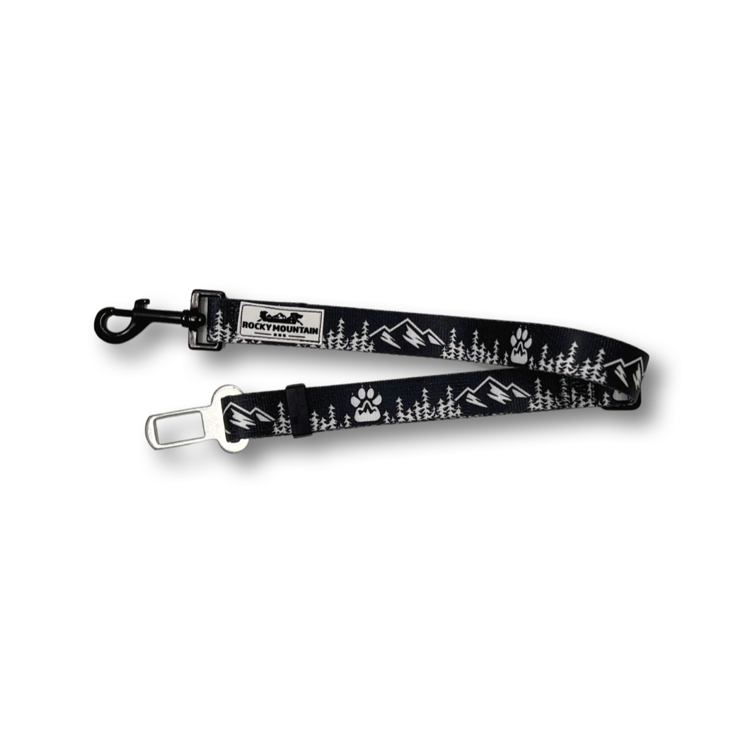 Black pet seatbelt with mountain and paw print design