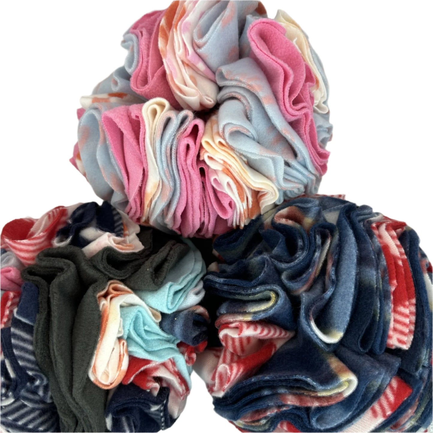 Three snuffle balls with many fabric folds to hide treats