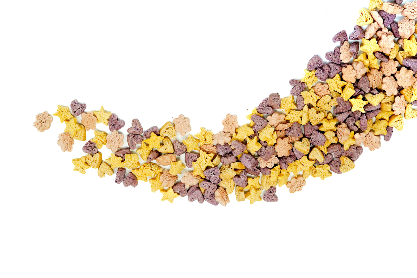 Mini donut biscuits scattered on white background