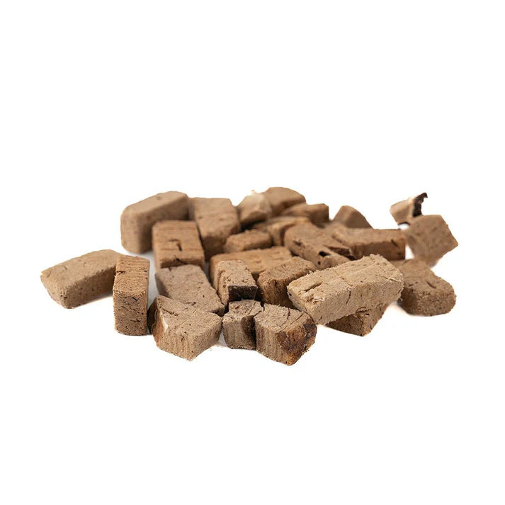 Pile of brown, rectangular chicken pet treats