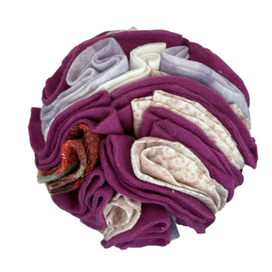 One snuffle ball with many fabric folds to hide treats