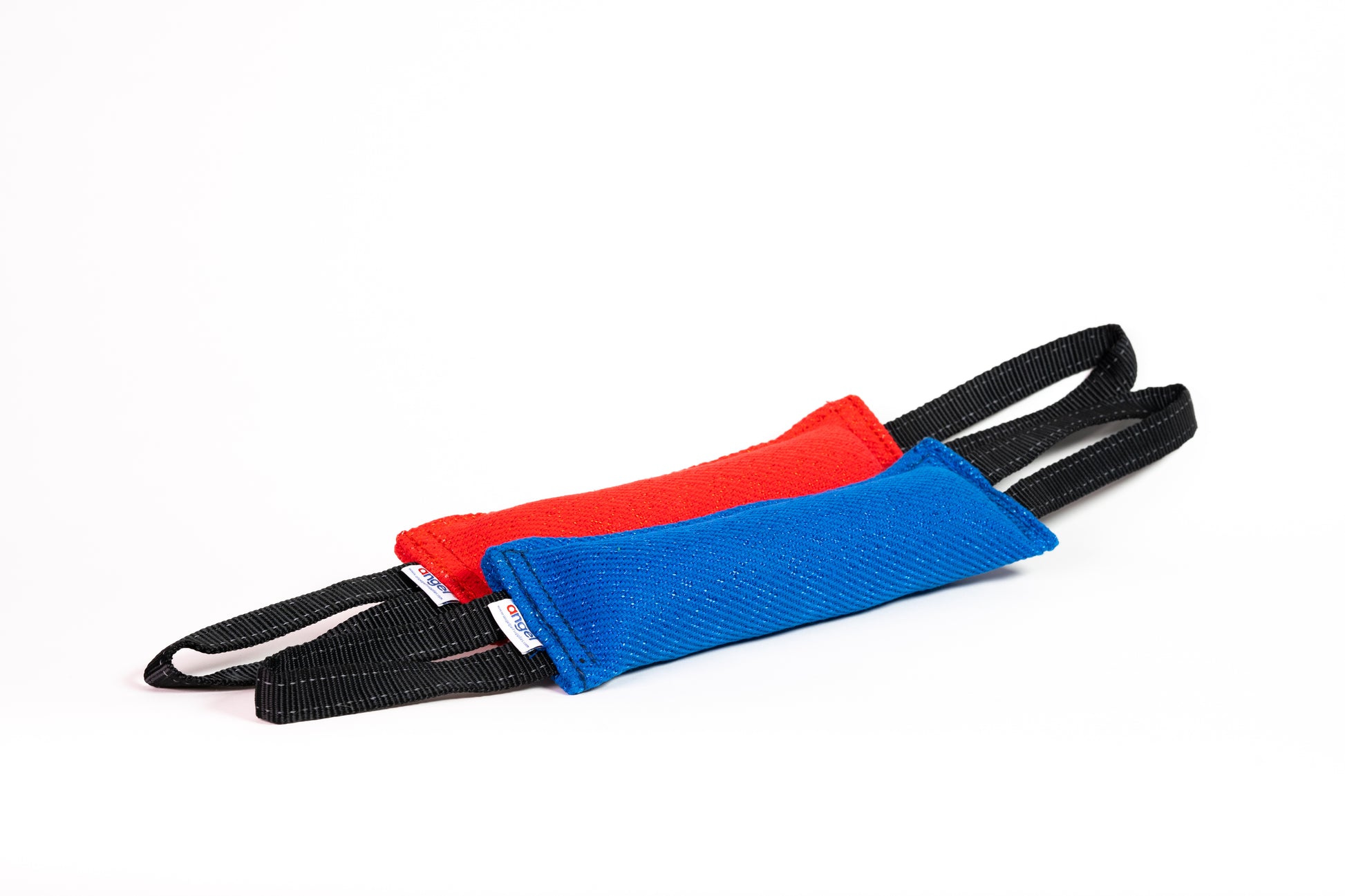 Red and blue padded tug toys on a white background.